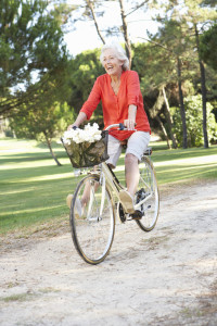 Senior Woman Enjoying Cycle Ride