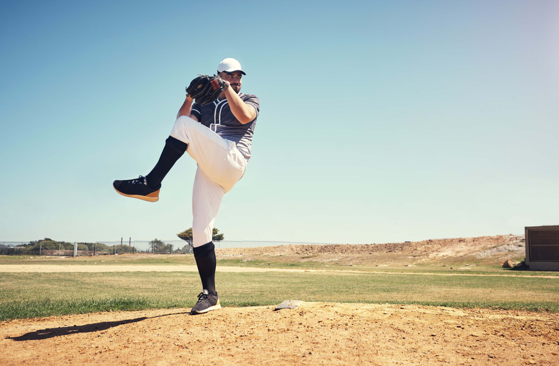 Baseball pitcher throwing baseball. Pitcher injured his rotator cuff, and will undergo a rotator cuff arthroscopy surgery. 