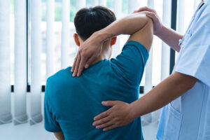 Doctor consulting patient in athletic clothing
