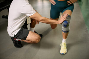 orthopedic rehab team working with patient